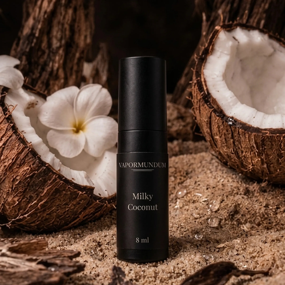 vapormundum Milky Coconut 8ml perfume accord travel atomizer with cracked raw coconut shell, frangipani flower, and desert sand
